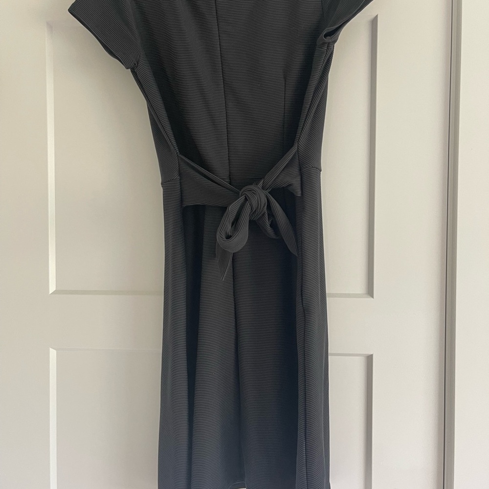Loft size 8 black cap sleeve dress with tie at waist. Above knee. Ribbed.